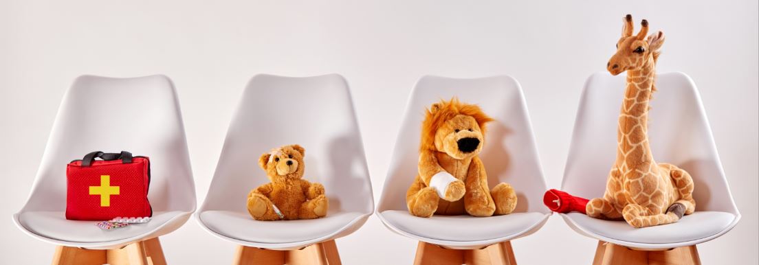 Stuffed animals in chair waiting to see doctor