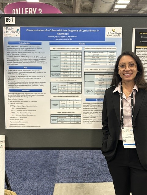 Woman standing in front of research poster